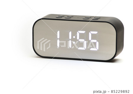 Clock with a time of 11 hours 55 minutes on a white background 85229892