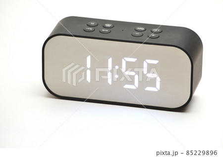 Clock with a time of 11 hours 55 minutes on a white background 85229896