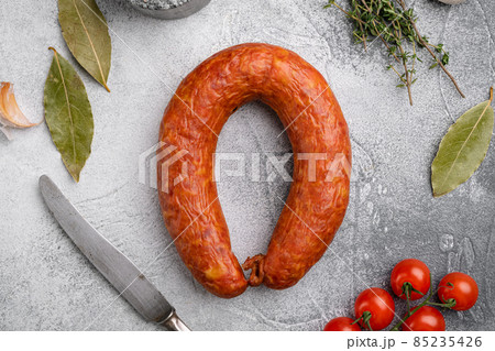 Portuguese smoked sausage, on gray stone table background, top view flat lay 85235426