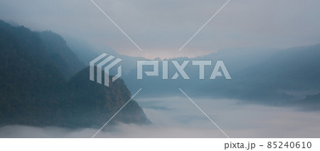 Beautiful view of mountains and white mist Beautiful view of mountains and white mist 85240610