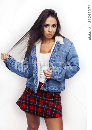 young happy smiling latin american teenage girl emotional posing isolated on white background, lifestyle people concept young happy smiling latin american teenage girl emotional posing isolated on white background, lifestyle people concept 85245374