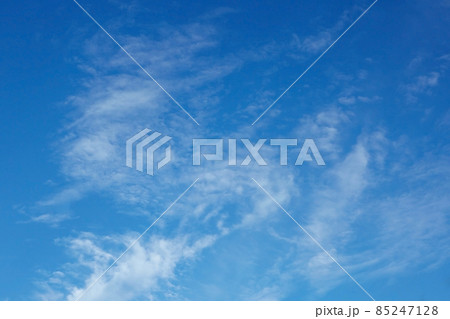 White cirrus clouds in the blue sky White cirrus clouds in the blue sky 85247128