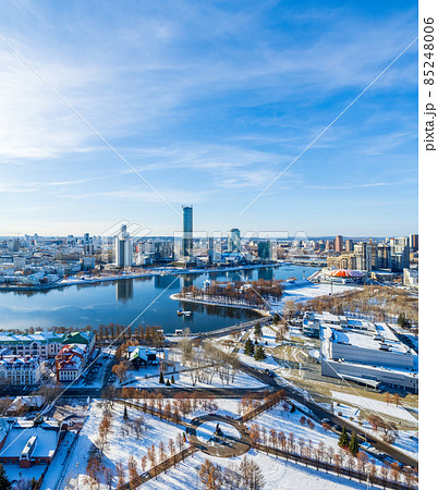 Yekaterinburg aerial panoramic view at Winter in sunny day. Ekaterinburg is the fourth largest city in Russia located in the Eurasian continent on the border of Europe and Asia. Yekaterinburg aerial panoramic view at Winter in sunny day. Ekaterinburg is the fourth largest city in Russia located in the Eurasian continent on the border of Europe and Asia. 85248006