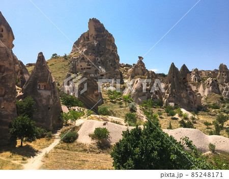 Cappadocia is not only hot air balloons, but also beautiful landscapes of houses in rocks and greenery. Cappadocia, magic music frozen in stone. 85248171