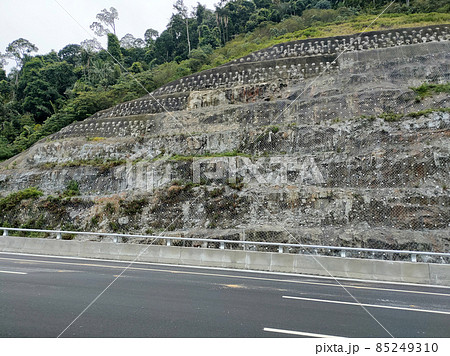 Soil Nailing. It is a ground stabilization technique that can be used on either natural or excavated slopes. It involves drilling holes for steel bars to be inserted into a s 85249310