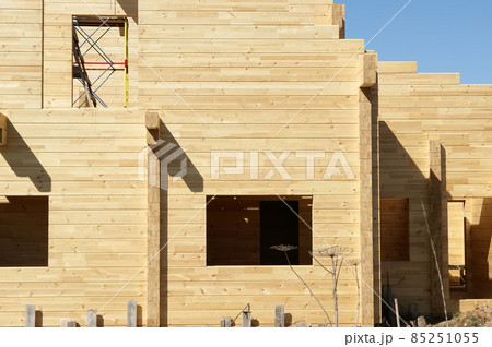 Abstract composition of new house frame construction and deep blue summer sky Abstract composition of new house frame construction and deep blue summer sky 85251055