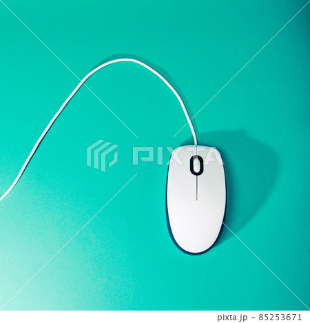 computer mouse on emerald background computer mouse on emerald background 85253671