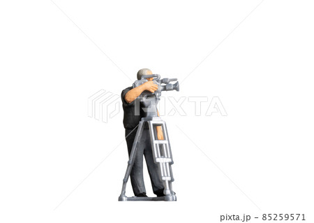 Cameraman working with television camera on a tripod isolated on white background with clipping path Cameraman working with television camera on a tripod isolated on white background with clipping path 85259571