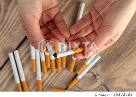 Quit smoking cigarette concept. The woman quits smoking cigarettes. Quit bad habit, health care concept. No smoking 85272233