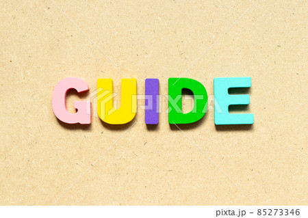 Color alphabet letter with word guide on wood background Color alphabet letter with word guide on wood background 85273346