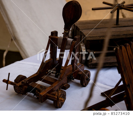 small wooden catapult model, miniature reproduction of medieval siege weapon small wooden catapult model, miniature reproduction of medieval siege weapon 85273410