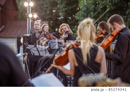 Orchestra having concert rehearsal on the street 85274341