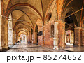 Arcades of the Gothic palace in the center of Piacenza. Italy 85274652