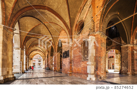Arcades of the Gothic palace in the center of Piacenza. Italy 85274652