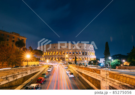 Rome, Italy. Colosseum Also Known As Flavian Amphitheatre In Evening Or Night Time. Rome, Italy. Colosseum Also Known As Flavian Amphitheatre In Evening Or Night Time. 85275056