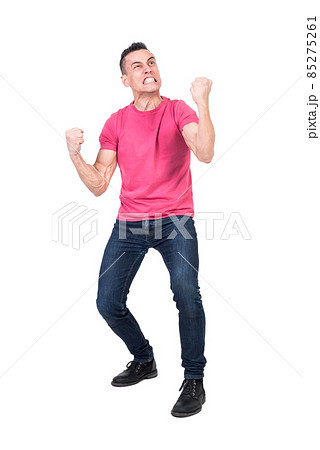 Hysterical guy grinding teeth nervously in white studio 85275261