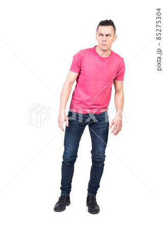 Suspicious man frowning and looking away. White background Suspicious man frowning and looking away. White background 85275304