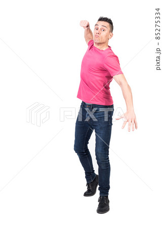 Aggressive man punching camera with fist. White background Aggressive man punching camera with fist. White background 85275334