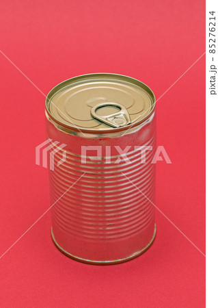 Unopened Tin Can with Blank Edge on Red Background 85276214