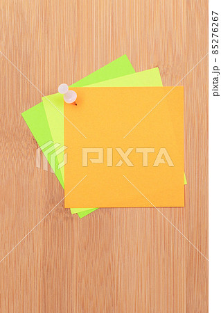 Colored Sticky Notes Pinned to the Wooden Message Board 85276267