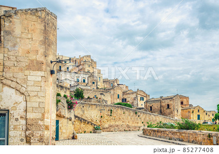 Stone streets and buildings in Matera town historical centre Sasso Caveoso of old ancient town Sassi di Matera 85277408