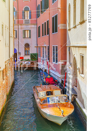 Venice cityscape with narrow water canal Venice cityscape with narrow water canal 85277769