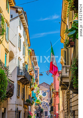 Typical italian street with traditional colorful buildings with shutter windows 85278424