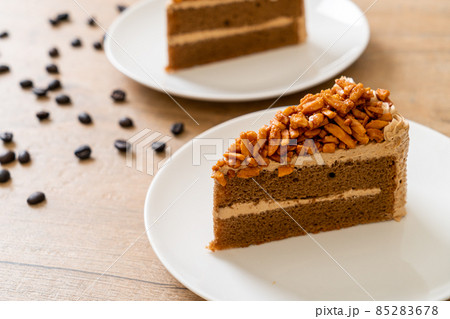 coffee almonds cake on plate 85283678