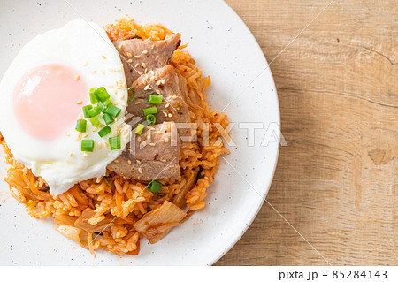 Kimchi fried rice with fried egg and pork Kimchi fried rice with fried egg and pork 85284143