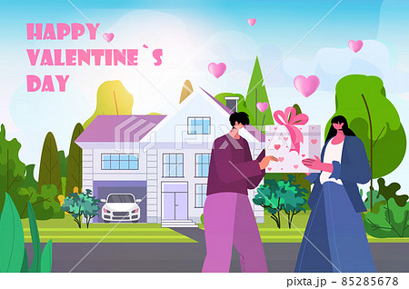 man giving present box for his woman happy valentines day celebration concept husband making surprise to wife man giving present box for his woman happy valentines day celebration concept husband making surprise to wife 85285678