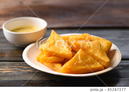 Deep fried Burmese tofu eating with spicy dipping sauce, Tai Yai food in Northern of Thailand 85287377