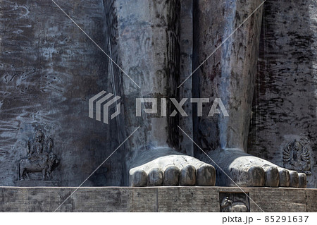 Closeup of feet of 108 ft Jain Idol of Rishabhdev Bhagwan believed to be the first Tirthankara in Jainism. Mangi Tungi, Nashik, Maharashtra, India. 85291637