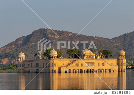 Evening view of Jal Mahal a palace in the middle of the Man Sagar Lake, Jaipur, Rajasthan, India. Evening view of Jal Mahal a palace in the middle of the Man Sagar Lake, Jaipur, Rajasthan, India. 85291899