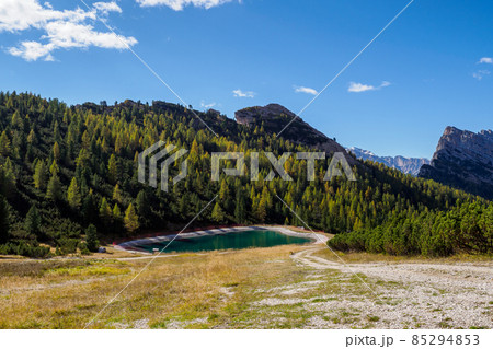 A reservoir for artificial snow production. Belluno Province, Dolomiti Alps, Italy 85294853