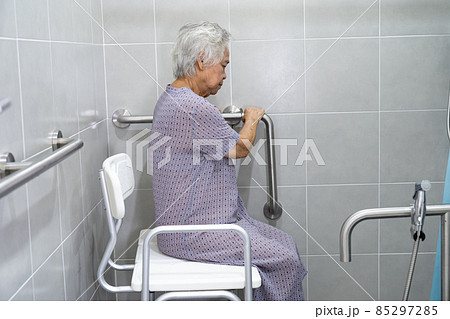 Asian senior or elderly old lady woman patient use toilet bathroom handle security in nursing hospital ward, healthy strong medical concept. Asian senior or elderly old lady woman patient use toilet bathroom handle security in nursing hospital ward, healthy strong medical concept. 85297285