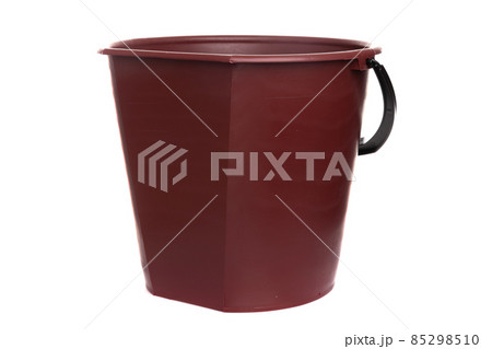 empty brown plastic bucket with black handle on white isolated background empty brown plastic bucket with black handle on white isolated background 85298510
