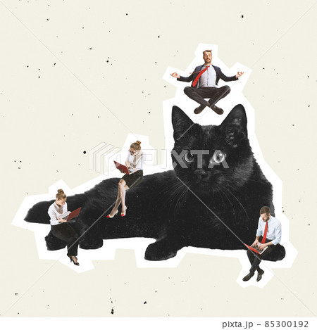 Business man and women sitting on big black cat on light background with dust effect. Contemporary art collage, modern design. 85300192