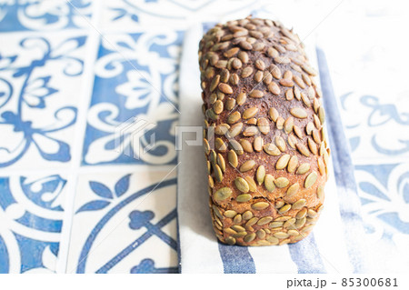Healthy rye sourdough loaf with pumpkin seeds. 85300681
