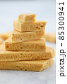 Dessert caramel honeycomb toffee on a white background. 85300941