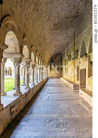 Spain, Girona, Colonnade in the courtyard of the Basilica in the city of Girona in Catalonia Spain 85301574