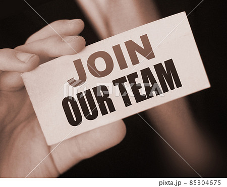 Businessman holds a card with the text Join Our Team. Business concept 85304675