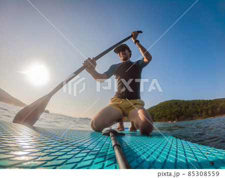 Attractive Man on Stand Up Paddle Board, SUP 85308559
