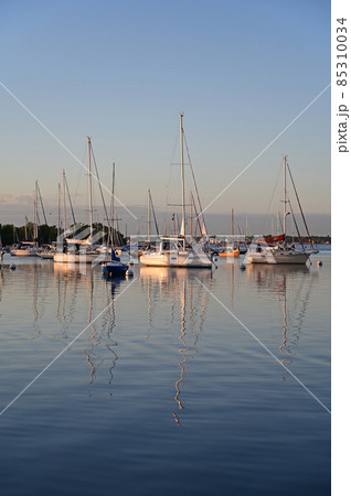 Moored sailboats off Coconut Grove in predawn light. Moored sailboats off Coconut Grove in predawn light. 85310034
