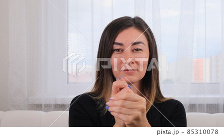 pretty female cares for her hands, spreading cream. Spa and wellness, skin care concept pretty female cares for her hands, spreading cream. Spa and wellness, skin care concept 85310078