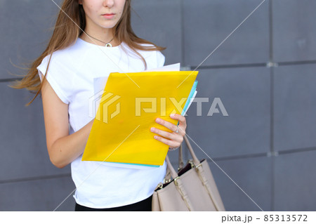 Business woman girl work business center look at documents Business woman girl work business center look at documents 85313572