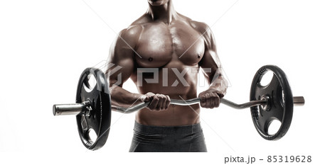 Young handsome man with naked torso and barbell 85319628