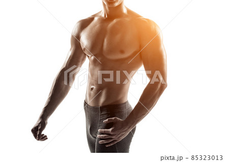 Strong man showing perfect body, abs and chest. Close-up Strong man showing perfect body, abs and chest. Close-up 85323013