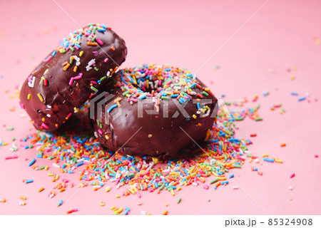 chocolate donuts on plate with copy space 85324908