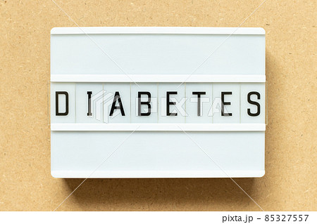 Lightbox with word diabetes on wood background 85327557