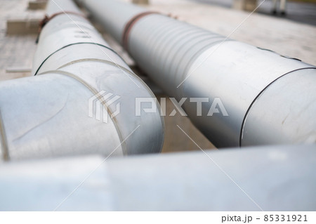 Steel long pipes close up view. Gas transportation Steel long pipes close up view. Gas transportation 85331921